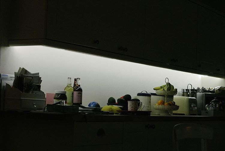 evening. strip lites in the kitchen. 💡